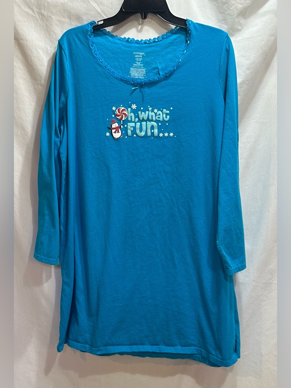 Woman’s Blue Sleepwear with a Holiday design.